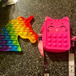 Popet and color is rainbow. The other one is pink.